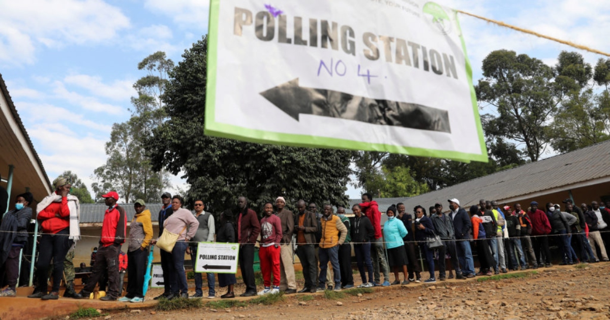 Voters lining up at a polling station in the 2022 general election.